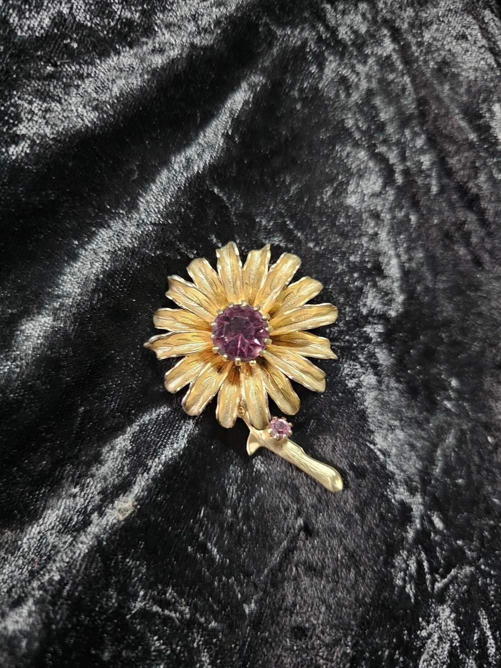 Gold Floral Brooch with Purple Gem Accent